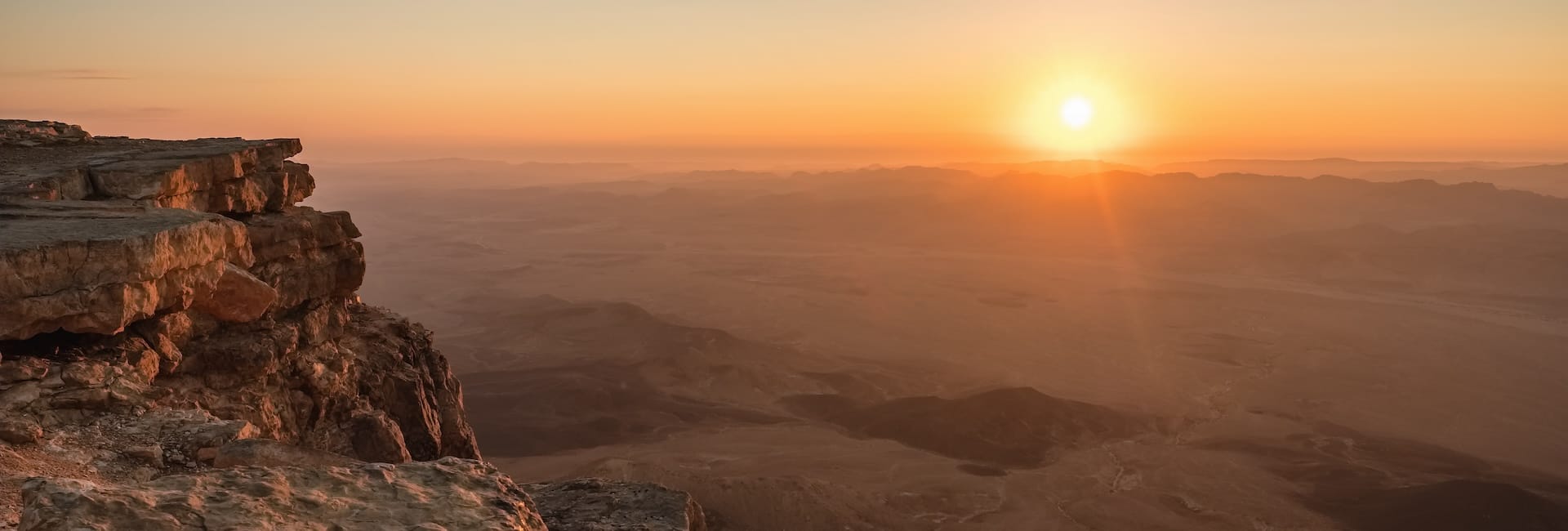 Where to travel in Israel - Negev desert (Makhtesh Ramon Crater at sunrise) DT 149449204